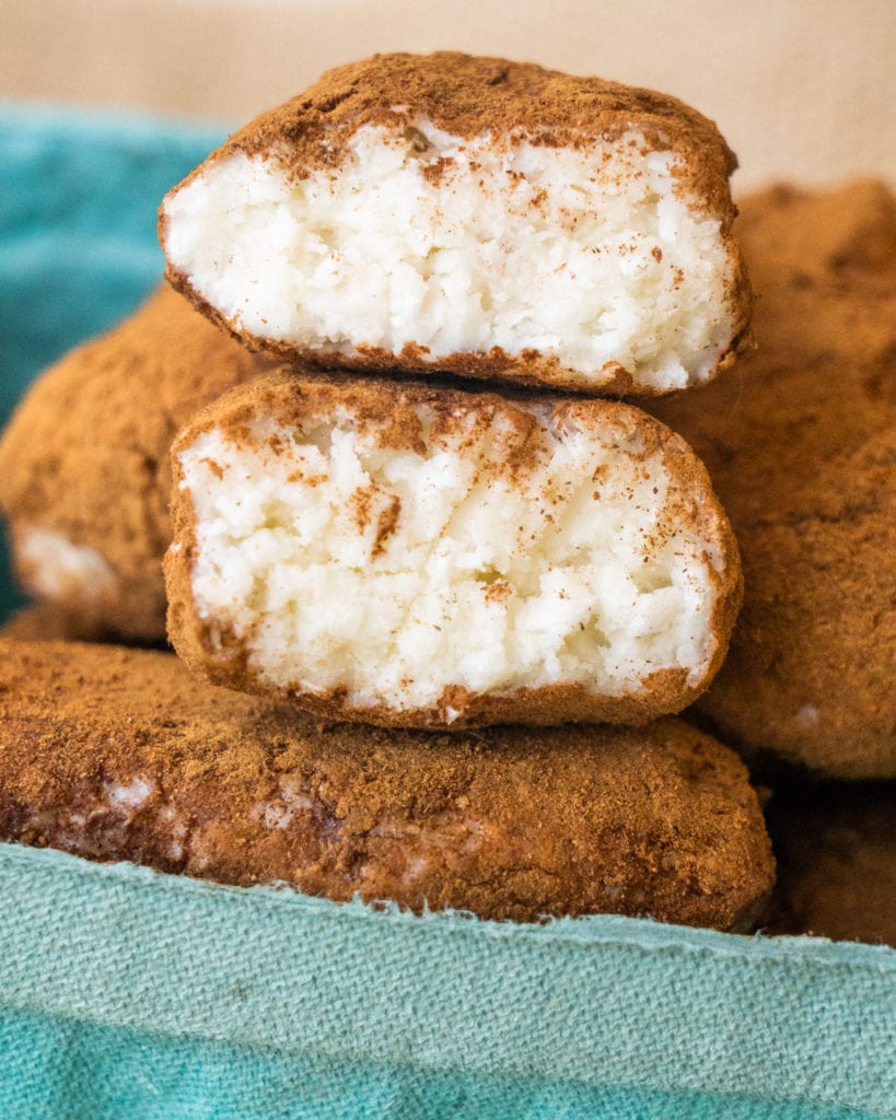 Homemade Irish Potato Candy that's easy to make and delicious!  This old fashioned candy looks just like potatoes! Made with cream cheese and powdered sugar. 