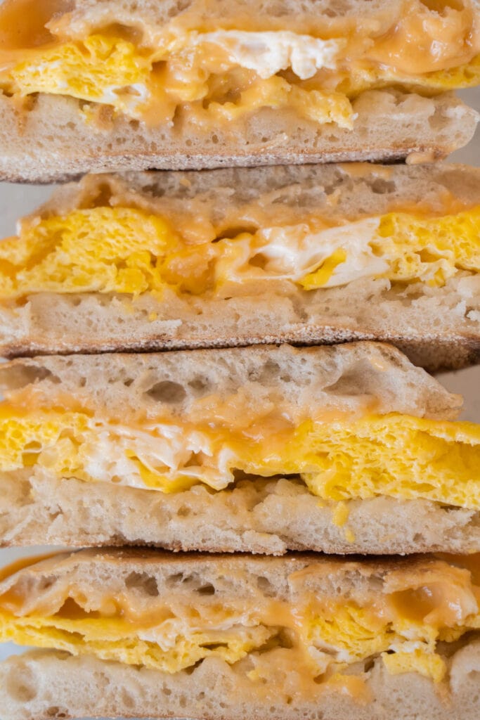 closeup of cheesy breakfast sandwiches.