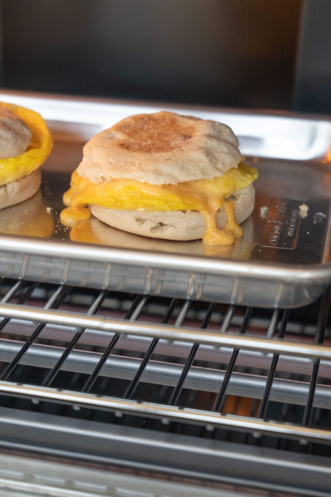 baked breakfast english muffin sandwich in toaster oven.