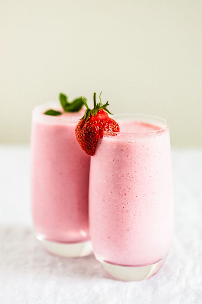 strawberry smoothies on table. 