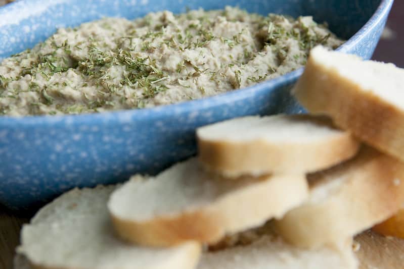 HEALTHY, DAIRY FREE, White Bean Lentil DIP! This homemade recipe is made with dried beans making this extremely cheap to make! Serve it hot or cold with vegetables and chips! It's one of the BEST Party dips!