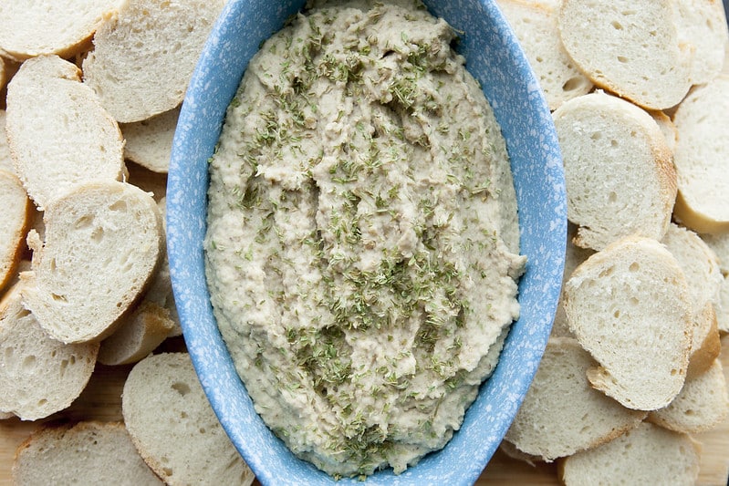 HEALTHY, DAIRY FREE, White Bean Lentil DIP! This homemade recipe is made with dried beans making this extremely cheap to make! Serve it hot or cold with vegetables and chips! It's one of the BEST Party dips!