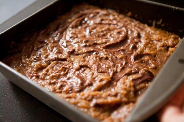 Delicious and extra fudgy 4 ingredient pumpkin brownies. They’re absolutely perfect for a quick Halloween treat. These easy pumpkin brownies are the ultimate fall dessert. All you need is a box of brownie mix, pumpkin purée, pumpkin pie spice, and chocolate chips! 