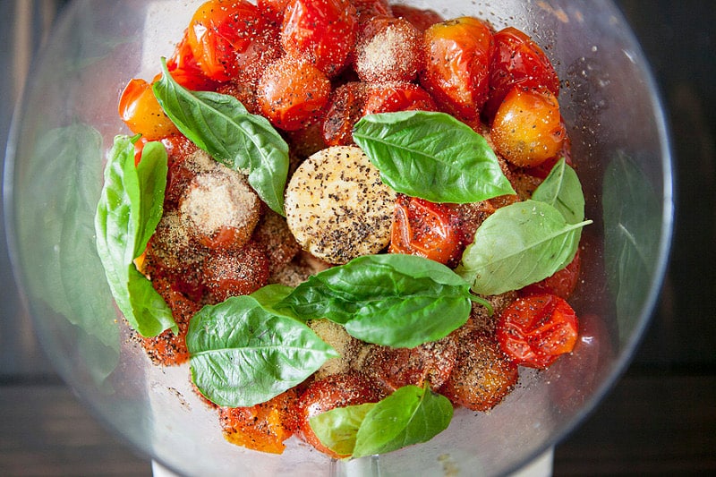 cherry tomatoes and basil in food processor