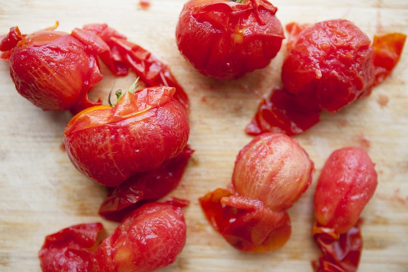 The BEST Stewed Tomatoes Ever recipe!  This easy to make recipe simmers tomatoes for 30 minutes to make homemade stewed tomatoes that can be served as a dinner side dish or can be canned.  This how to make recipe shows you how easy they are to make! Find out why everyone considers them THE BEST!   We always use this as a canning recipe for our Summer garden tomatoes! 