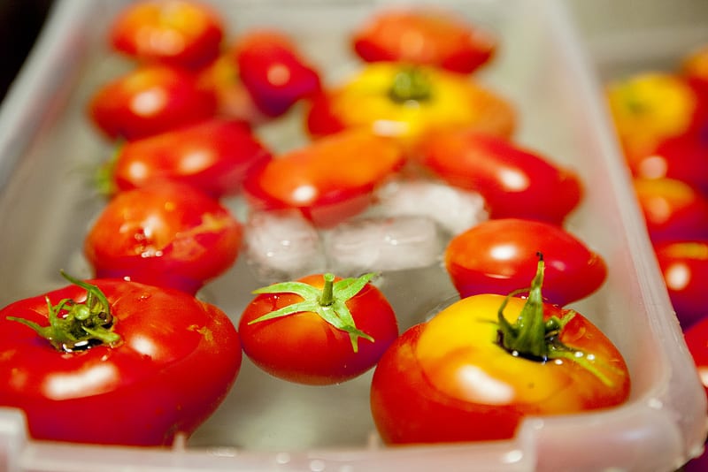 The BEST Stewed Tomatoes Ever recipe!  This easy to make recipe simmers tomatoes for 30 minutes to make homemade stewed tomatoes that can be served as a dinner side dish or can be canned.  This how to make recipe shows you how easy they are to make! Find out why everyone considers them THE BEST!   We always use this as a canning recipe for our Summer garden tomatoes! 