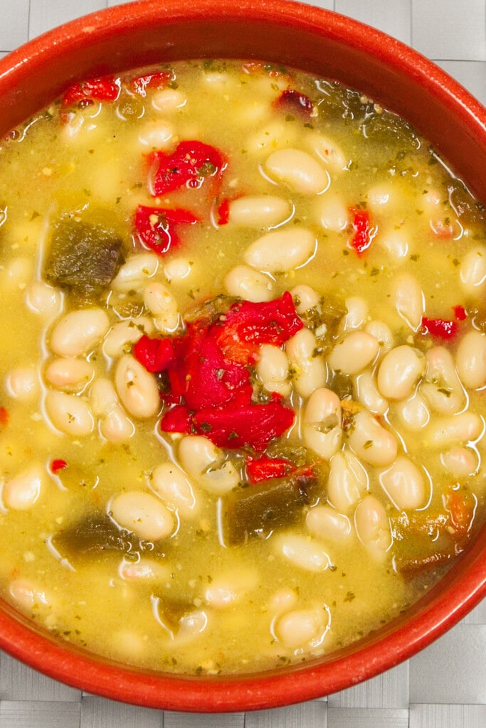 bean and pepper soup in red bowl.