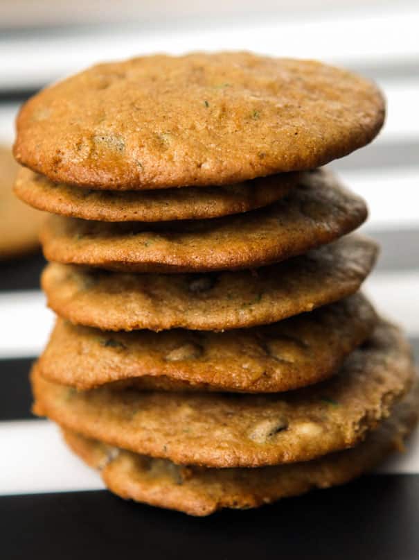 Let’s bake some EASY Chocolate Chip Zucchini Cookies! If you love a crispy, crunchy cookie, this cookie recipe is for you. These cookies could not be more simple to whip up and they’re ready to eat in just 15 minutes! They’re so scrumptious your kids won’t even mind the vegetables we’re adding into these cookies!