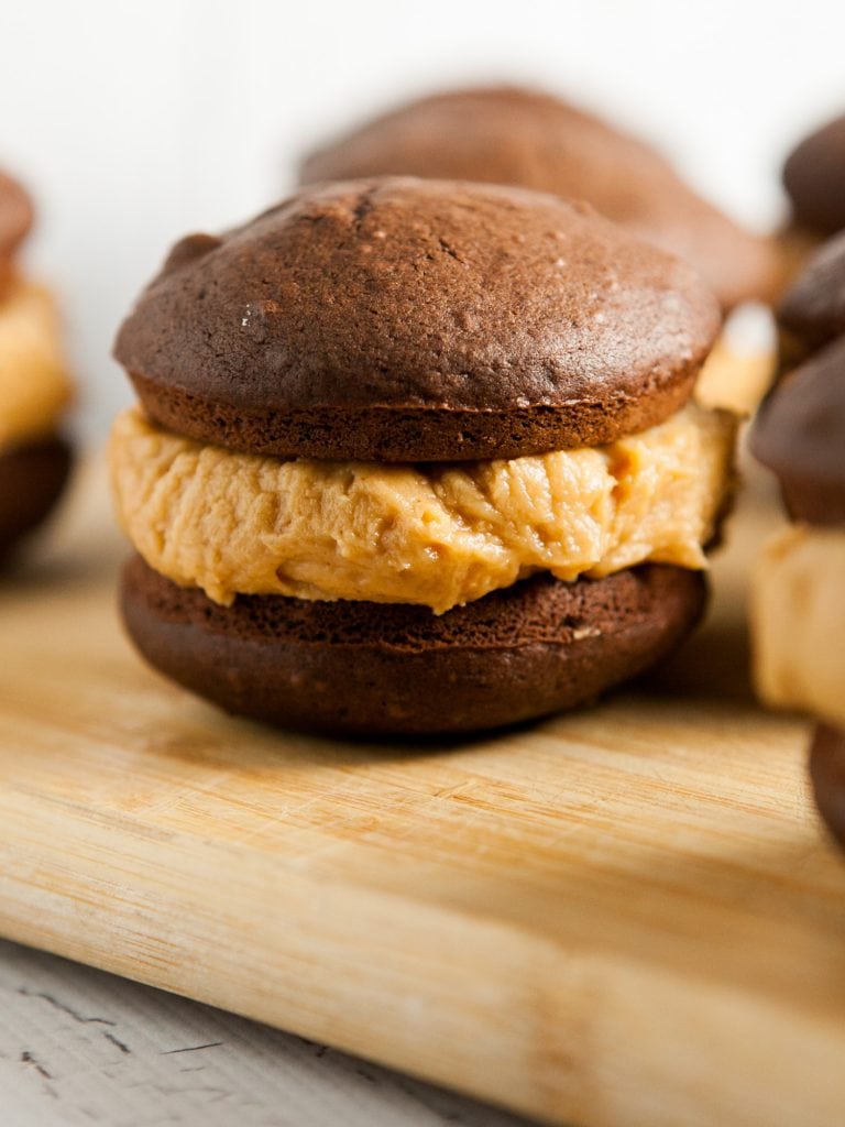 chocolate whoopie pies on table.