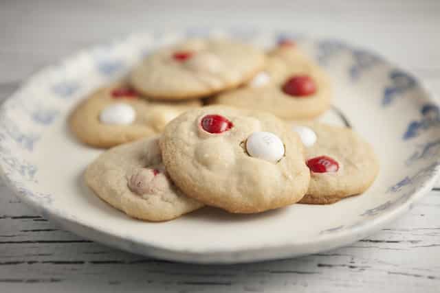 Super yummy Cookies made with Peppermint White Chocolate M&M's! Each cookie has a sugary, peppermint, chocolate taste to them. 
