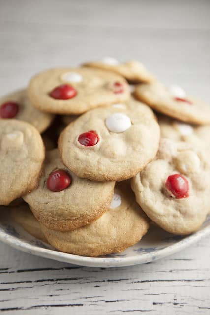 Super yummy Cookies made with Peppermint White Chocolate M&M's! Each cookie has a sugary, peppermint, chocolate taste to them. 