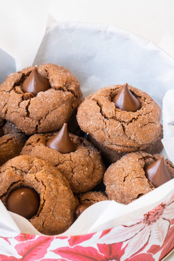 peanut butter blossoms in cookie tin.