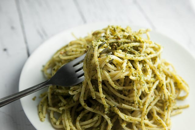 BUDGET FRIENDLY Basil Pesto Pasta recipe made with fresh basil and almonds! This easy, healthy homemade recipe makes delicious basil pesto that can be served over pasta, as appetizers or on a sandwich! Pine nuts are expensive so this is a much more budget friendly pesto.