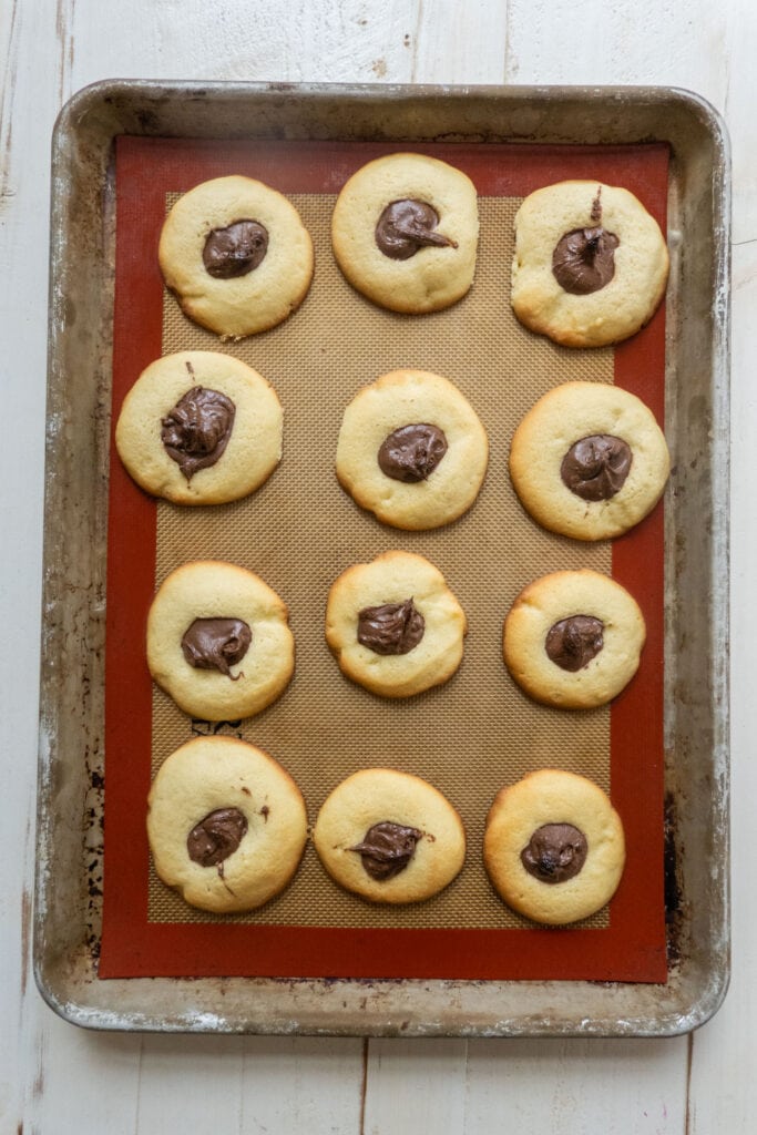 baked nutella cookies on cookie sheet.