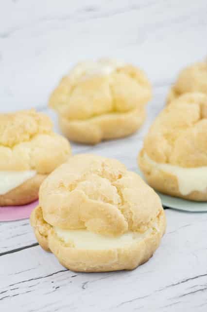 Delicious Cream Puffs Filled with Vanilla Pudding recipe that tastes just like the bakery! Recipe makes one dozen cream puffs. 