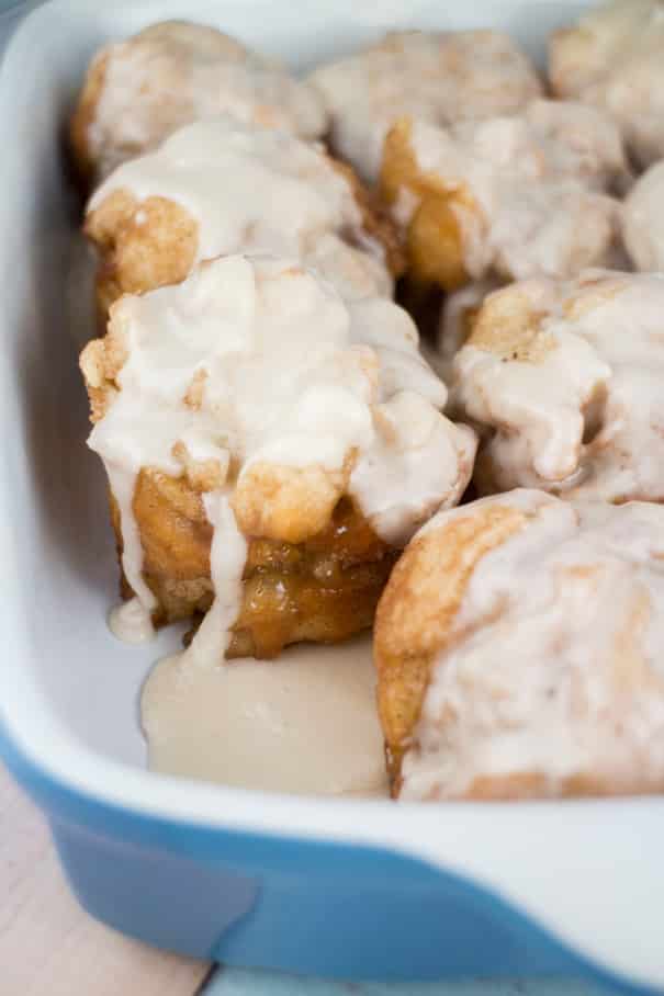 Easy Cinnamon Rolls recipe ready in 12 minutes! Use refrigerated biscuits to make homemade Cinnamon Rolls with a powdered sugar icing that your kids will fall in love with!  These Cinnamon Rolls are quick and delicious - perfect for Saturday morning breakfast.