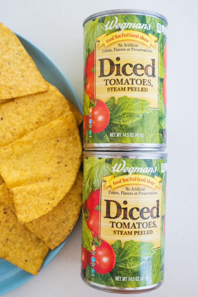 cans of diced tomatoes in table.