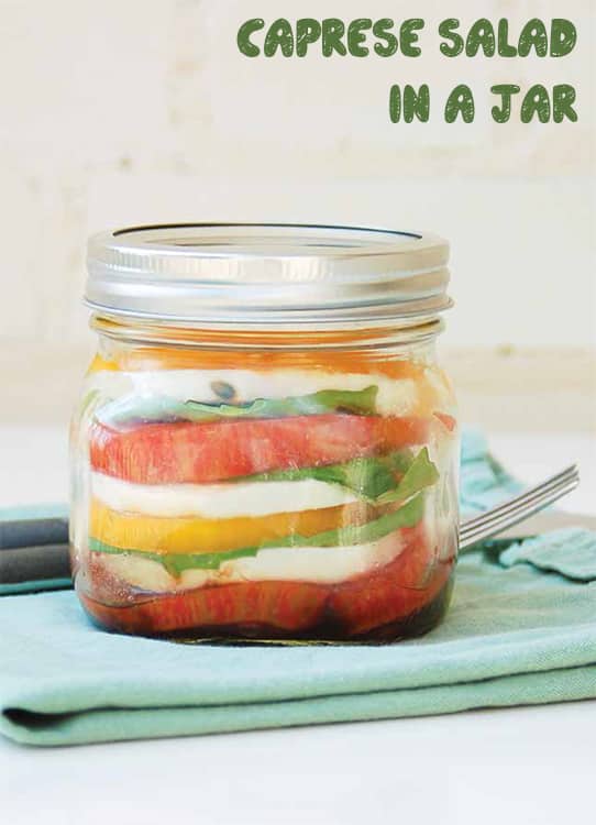 Easy to make Mason Jar Carpese Salad Recipe. Ingredients for this healthy salad include tomatoes, mozzarella cheese, balsamic vinaigrette and basil.
