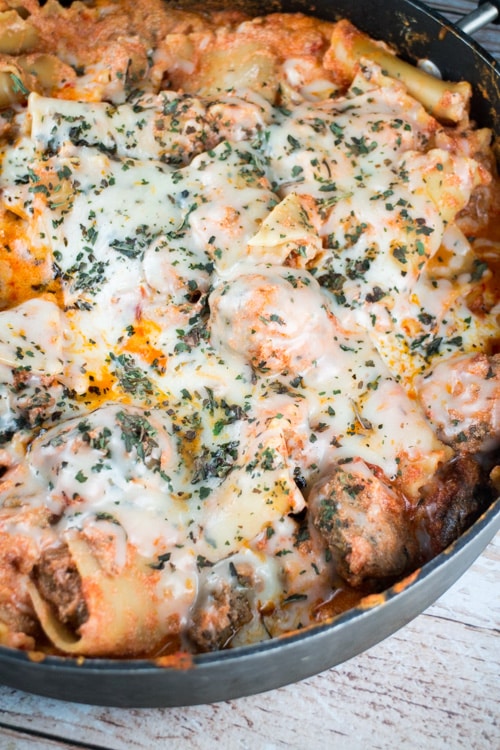 You'll love this STOVETOP Cheesy Meatball Lasagna Skillet! This quick and easy stovetop lasagna recipe includes ricotta and mozzarella cheese to make it extra cheesy! You'll love how delicious the noodles, cheese, sauce and meatballs cook together! The recipe is ready in 25 minutes!