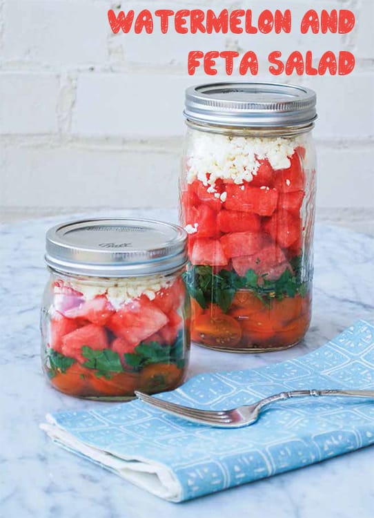 Easy to make Mason Jar Watermelon and Feta Salad. Ingredients include watermelon, feta, tomatoes, sherry vinaigrette and parsley!