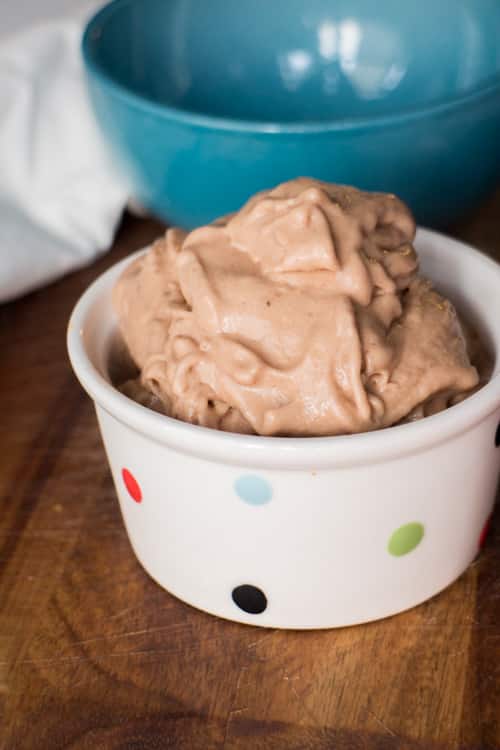 3 ingredient Frozen Banana Ice Cream recipe, only 150 calories a serving! This easy healthy recipe tastes just like soft serve, no ice cream maker needed! All you need is bananas, peanut butter and cocoa powder.   