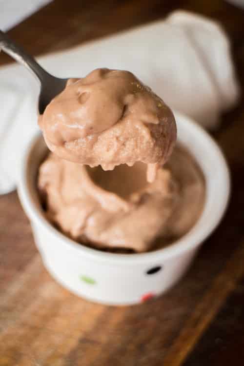 3 ingredient Frozen Banana Ice Cream recipe, only 150 calories a serving! This easy healthy recipe tastes just like soft serve, no ice cream maker needed! All you need is bananas, peanut butter and cocoa powder.   