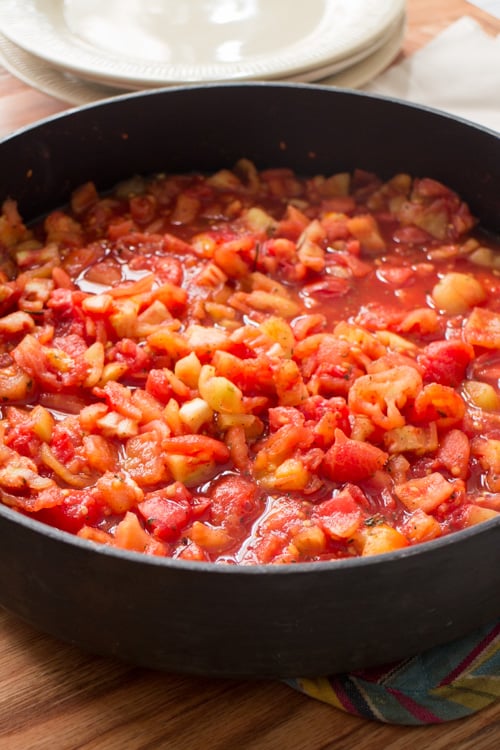 Easy step by step instructions with pictures on how to make diced tomatoes from fresh tomatoes. Steps walk you through the beginning all the way up to freezing them. This is a great way to preserve garden tomatoes if you're picking a lot of them!