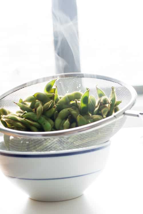 Edamame is easy to make at home and tastes just like the Japanese restaurant! All you need is soybeans and salt! 