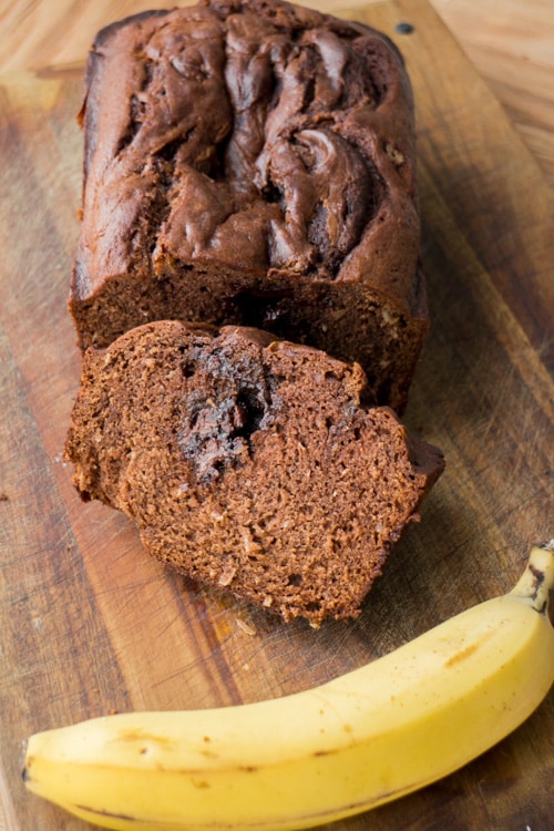 Nutella Swirled Banana Coconut Bread. One of the most delicious banana bread recipes that has creamy chocolate inside of it!