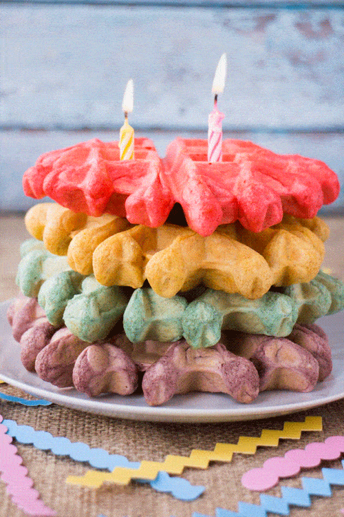 Big FLUFFY Belgian Rainbow Waffles are easy to make, taste delicious and will make any celebration even more special! This rainbow waffle recipe is the perfect birthday breakfast in bed and a good one to serve up on St. Patrick’s Day (or any day)!