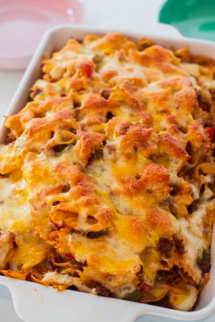 baked taco casserole with browned cheese on top.