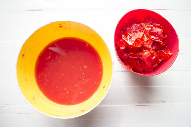 bowl of tomato skins and tomato juice
