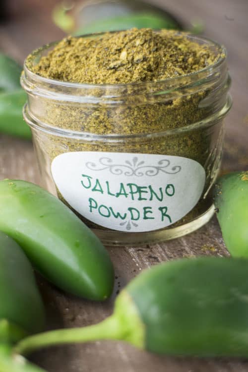 EASY STEP BY STEP directions on How to Make Ground Chili Powder from Jalapeno Peppers!  This homemade recipe shows how to dry jalapeno peppers and then crush into ground seasoning.  It's a super easy DIY project, perfect if you have extra jalapeno peppers!  I do this every Summer with our garden peppers!