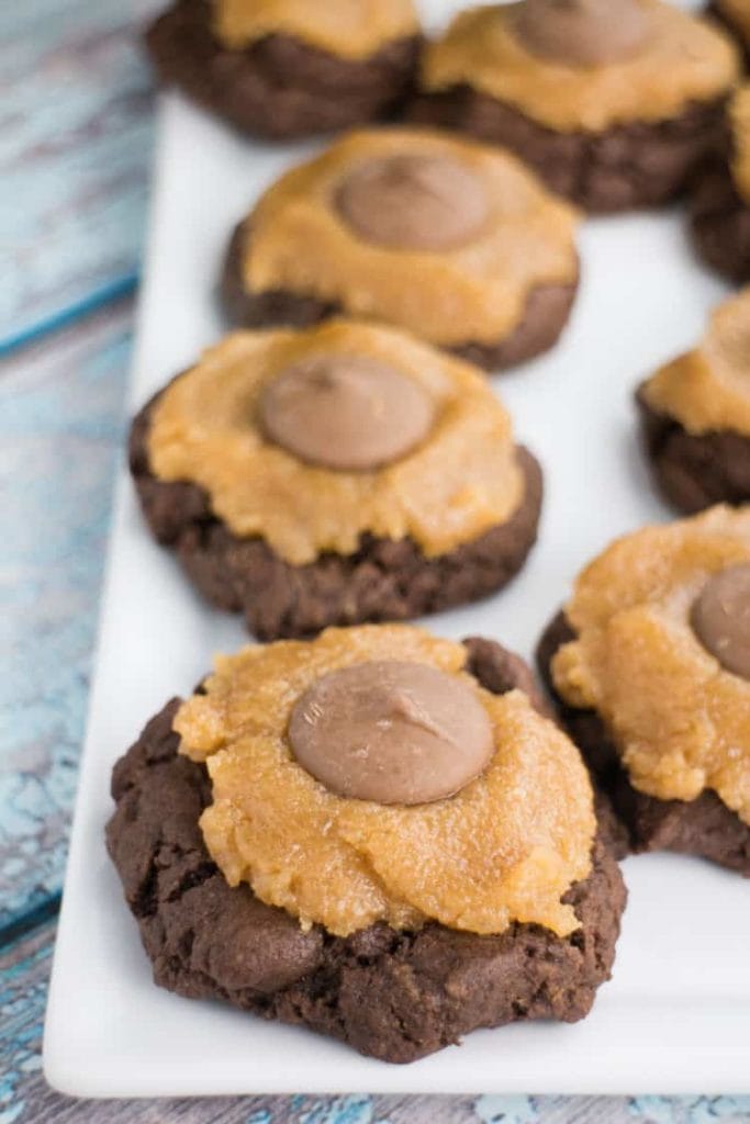 Scrumptious Chocolate Cookies With DA BOMB Peanut Butter Frosting. The most popular cookie that friends and families ask me to make! Recipe makes 2 dozen cookies.