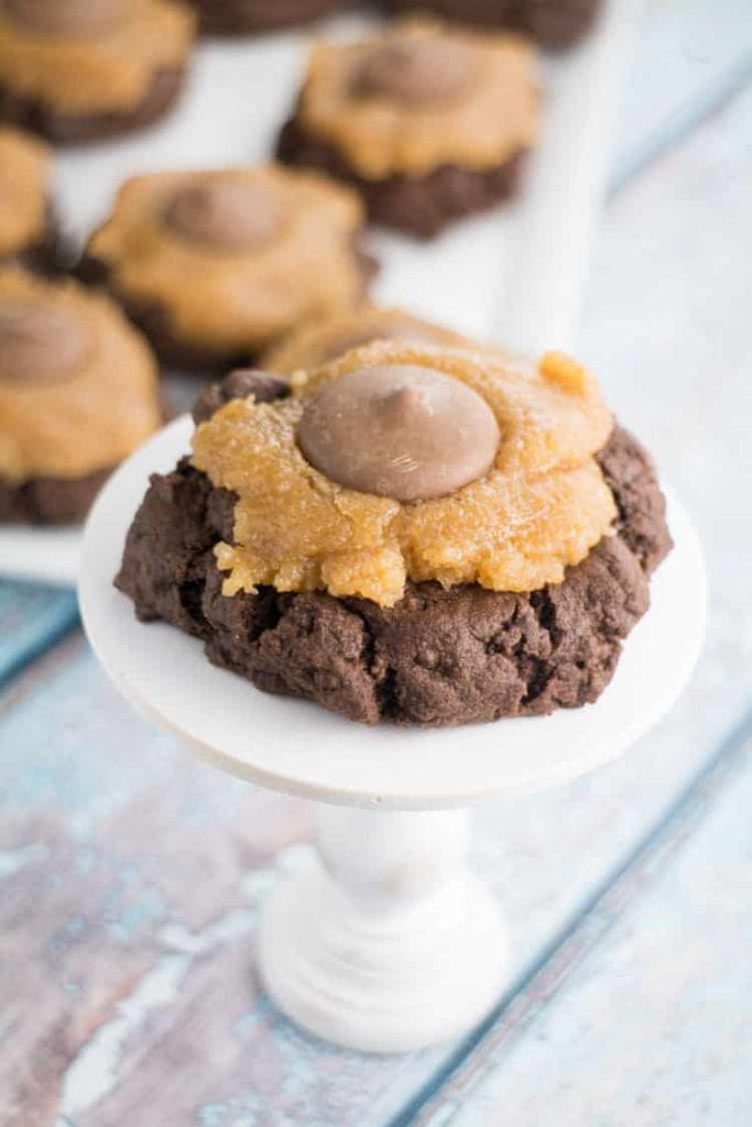 Scrumptious Chocolate Cookies With DA BOMB Peanut Butter Frosting. The most popular cookie that friends and families ask me to make! Recipe makes 2 dozen cookies.