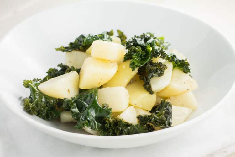 This easy recipe for Simple Potato Kale Salad is one of my favorite healthy meals or side dishes. The ingredients are straightforward: potatoes, kale, and olive oil – that’s it! Paleo, Whole30-compliant, and vegan friendly.