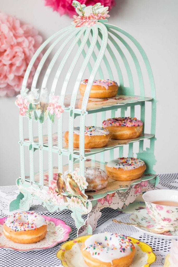 paper bird cage with donuts in it