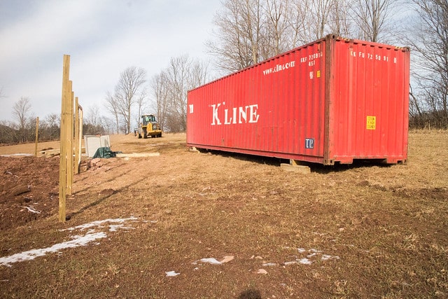 Delivery of our first shipping container to build our tiny house in Upstate New York!  This post shows pricing and how to get it delivered.