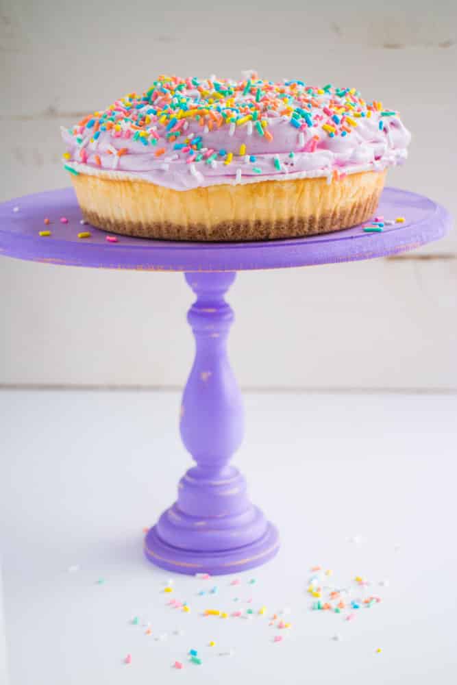 Blueberry Whipped Cream Cheesecake - a beautiful and delicious pastel sprinkled cake! The blueberries give the whipped topping it's pretty color. 