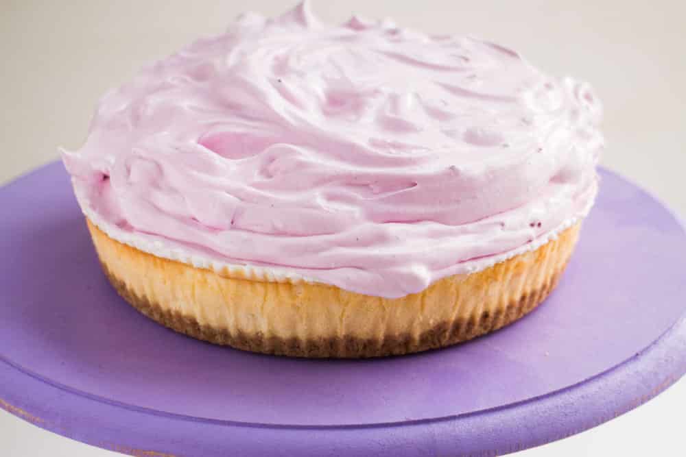 Blueberry Whipped Cream Cheesecake - a beautiful and delicious pastel sprinkled cake! The blueberries give the whipped topping it's pretty color. 