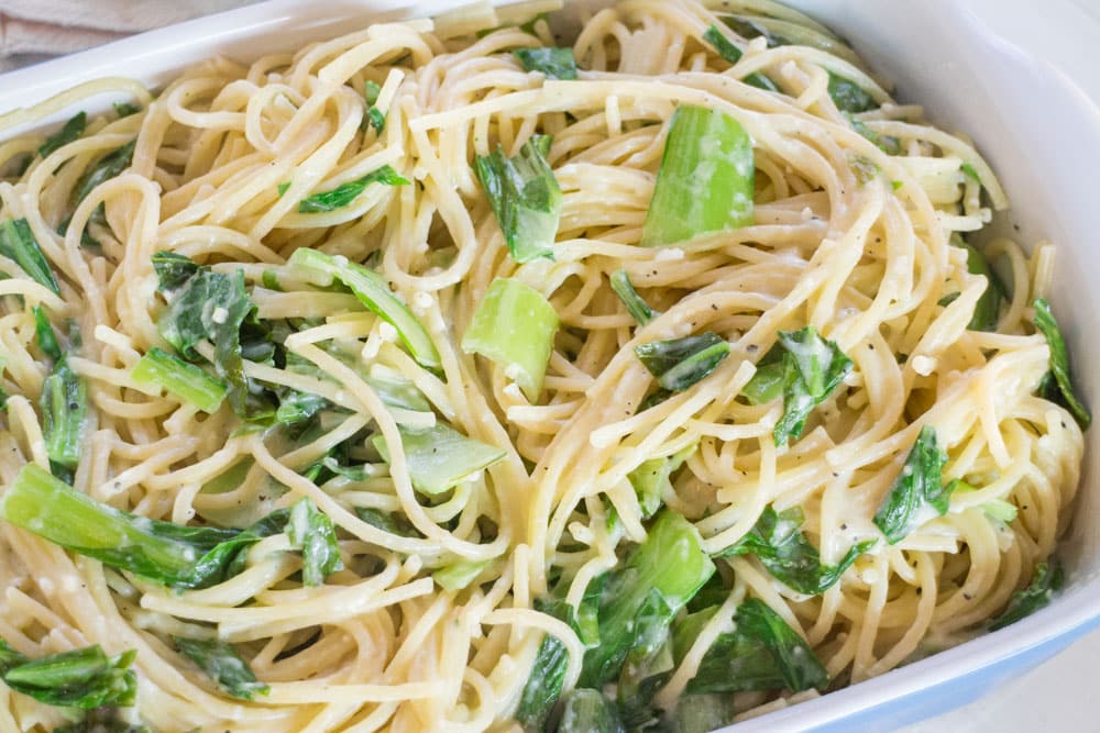 Creamy Bok Choy Spaghetti is a delicious healthy meal that your family will love! It only uses 1/2 cup Parmesan Cheese and takes under 15 minutes to make!