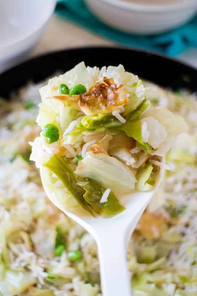 20 MINUTE Buttered Cabbage and Rice dinner! This is one of my favorite weeknight recipes that uses sauteed cabbage and peas! It's a healthy, easy vegetarian meal my entire family loves! You can even use instant rice to make it even more simple!