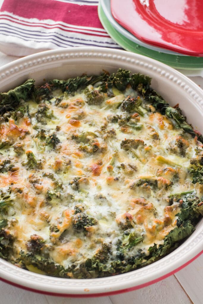 broccoli cheese quiche in circular pie dish.