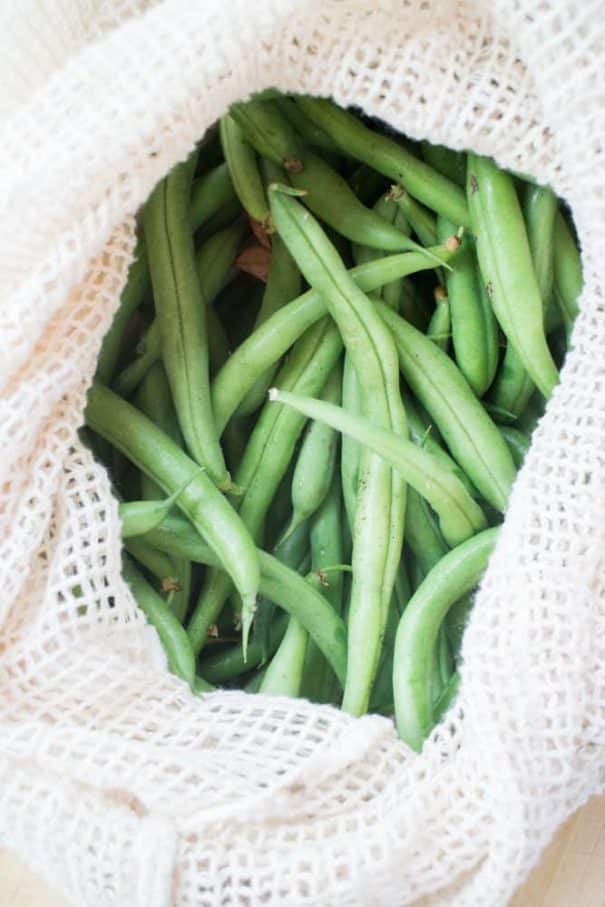 fresh green beans in market bag