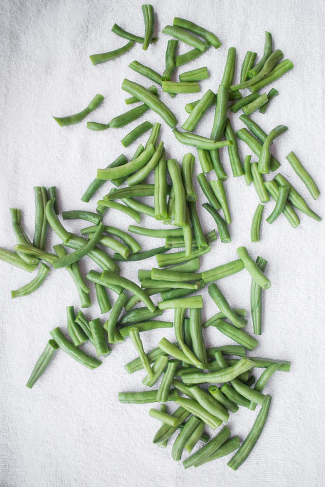 Easy step by step instructions on how to freeze green beans without blanching. These green beans will last up to a year.