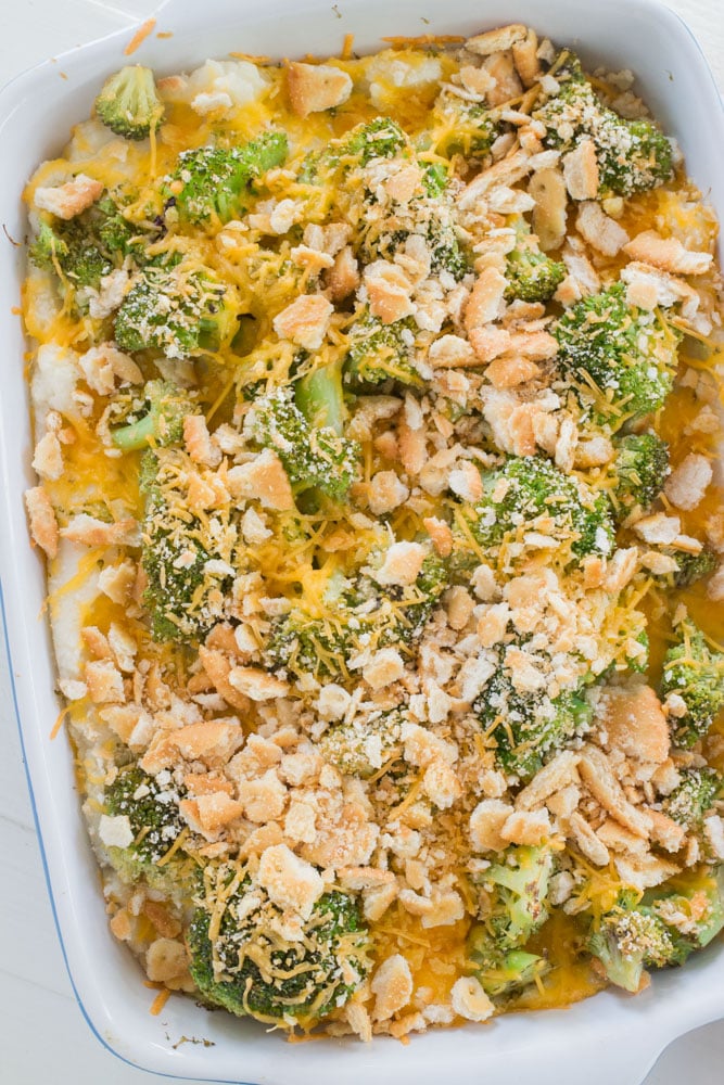 Instant Mashed Potatoes Cheesy Broccoli Casserole is a comfort food dish that will have your entire family begging for more! It uses Instant Mashed Potatoes so it's easy to make. It's the perfect side dish for the holidays because it's cheesy and delicious and only takes 5 minutes to prepare, 25 minutes to bake.