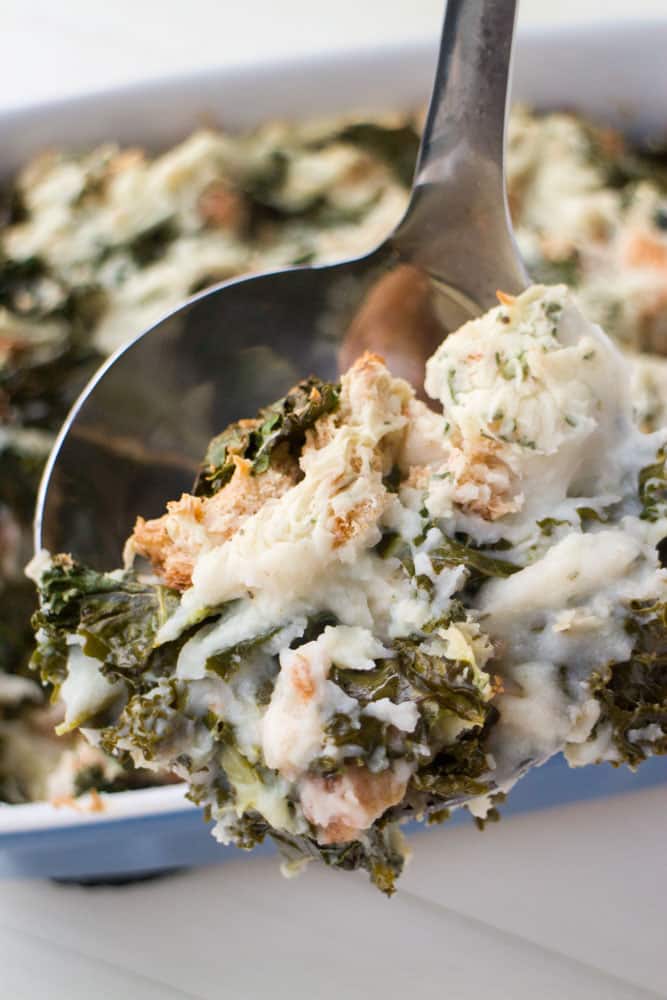 This Potato Kale Stuffing is a comfort food recipe that goes perfect with a chicken, pork chop or steak dinner. It’s simple to make because it’s made with instant potatoes! Potato Kale Stuffing is also always requested at Thanksgiving! The perfect hearty side dish for your holiday meal.