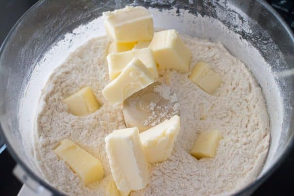 You only need one bowl for this Easy Scones Recipe! The secret to this homemade recipe is sour cream which makes light scones!  Serve these crumbly English soft scones with clotted cream, jam and tea!  You can add blueberry or raspberry to them to make them berry flavored! 