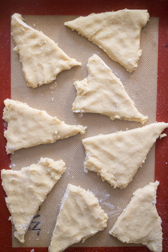 You only need one bowl for this Easy Scones Recipe! The secret to this homemade recipe is sour cream which makes light scones!  Serve these crumbly English soft scones with clotted cream, jam and tea!  You can add blueberry or raspberry to them to make them berry flavored! 