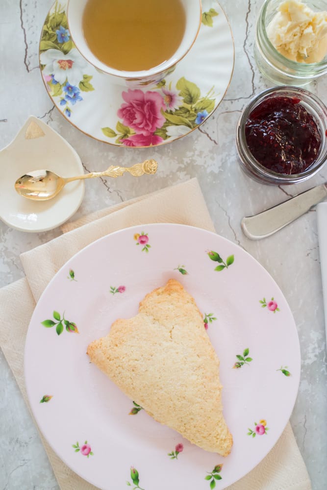 You only need one bowl for this Easy Scones Recipe! The secret to this homemade recipe is sour cream which makes light scones!  Serve these crumbly English soft scones with clotted cream, jam and tea!  You can add blueberry or raspberry to them to make them berry flavored! 